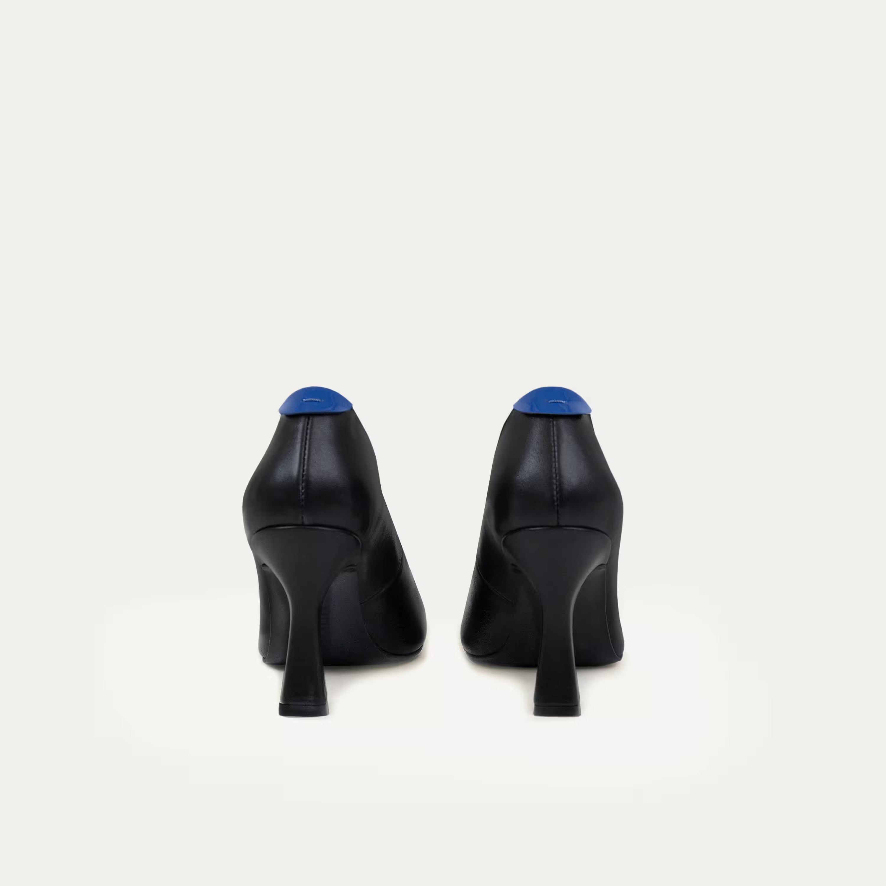 HUHUA ROUGE handcrafted women's leather pumps back view Sky